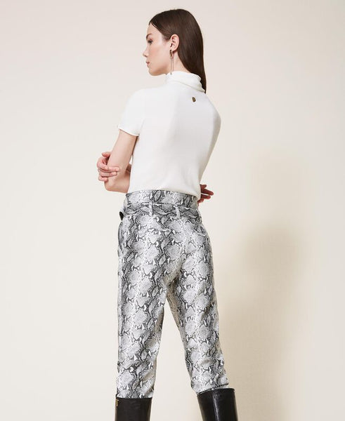 Pantaloni in similpelle animalier