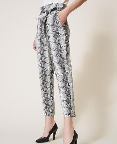 Pantaloni in similpelle animalier