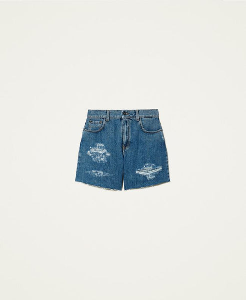 Shorts in jeans con rotture